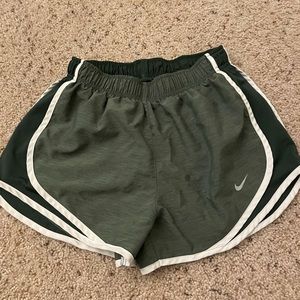 Green and white Nike athletic shorts!